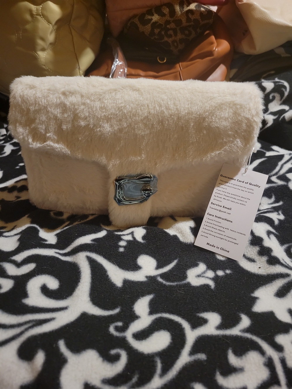 Faux Fur Cream Clutch Bag with Silver Accent